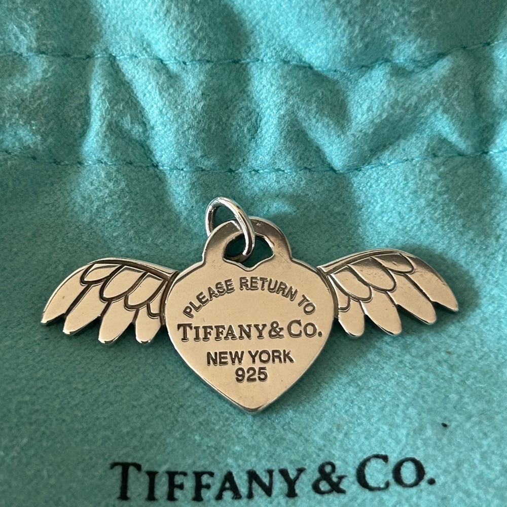 Tiffany rare heart with wings charm